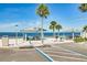 Designated parking near a beach with covered picnic areas, tables, and easy beach access at 4256 Rudder Way, New Port Richey, FL 34652