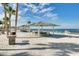 Picturesque beachfront featuring picnic tables, grilling area, and beautiful waterfront views at 4256 Rudder Way, New Port Richey, FL 34652