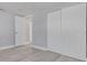 This bedroom has neutral walls, light-colored floors and closet at 4256 Rudder Way, New Port Richey, FL 34652