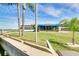 Well-maintained green area by the water's edge, showcasing scenic views of the Gulf Harbors Yacht Club at 4256 Rudder Way, New Port Richey, FL 34652