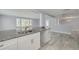 Kitchen island overlooking breakfast area and Gathering room, perfect for entertaining at 4256 Rudder Way, New Port Richey, FL 34652