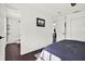 Comfortable bedroom with ensuite bathroom featuring subway tile shower with glass door and luxury fixtures at 5007 Starfish Se Dr # A, St Petersburg, FL 33705