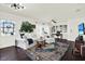 Cozy living room with stylish furnishings, hardwood floors, and ample natural light at 5007 Starfish Se Dr # A, St Petersburg, FL 33705