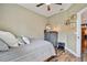 Serene bedroom featuring warm tones, minimalist decor, and stylish wood flooring at 5416 Twin Creeks Dr, Valrico, FL 33596