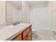 Bathroom featuring a white sink and vanity, toilet, and combined shower and bathtub at 5902 War Admiral Dr, Wesley Chapel, FL 33544
