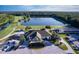 Beautiful Lexington clubhouse overlooks manicured greens, large lake and meticulously maintained landscaping at 5902 War Admiral Dr, Wesley Chapel, FL 33544