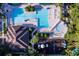 Overhead view of a large community pool featuring a splash pad and playground at 5902 War Admiral Dr, Wesley Chapel, FL 33544
