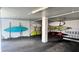 Spacious storage room with kayaks and ladders, providing ample space for recreational equipment at 719 Pinellas Bayway S # 309, Tierra Verde, FL 33715