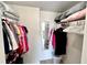 Organized walk-in closet with ample hanging space and shelving for storage solutions at 719 Pinellas Bayway S # 309, Tierra Verde, FL 33715