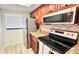 Bright condo kitchen features stainless steel appliances and granite counters at 719 Pinellas Bayway S # 309, Tierra Verde, FL 33715