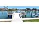 Scenic waterfront view with a private dock, perfect for boating and enjoying the water at 719 Pinellas Bayway S # 309, Tierra Verde, FL 33715