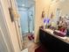 Bathroom vanity with granite countertop, shower, and neutral color palette at 724 15Th S Ave, St Petersburg, FL 33701