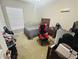 Bedroom features include a twin bed, carpeting, and window with blinds at 724 15Th S Ave, St Petersburg, FL 33701