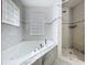Close-up of a jacuzzi tub in a bright bathroom at 7609 Barry Rd, Tampa, FL 33615