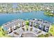 Aerial view of waterfront townhomes showcasing prime location, boat docks, and community layout at 772 Gran Kaymen Way, Apollo Beach, FL 33572