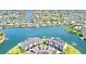 Aerial view showcasing beautiful waterfront homes, community amenities, and scenic surroundings at 772 Gran Kaymen Way, Apollo Beach, FL 33572