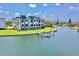 Beautiful waterfront townhome complex with private boat docks, offering stunning views and convenient access to the water at 772 Gran Kaymen Way, Apollo Beach, FL 33572