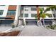 Modern townhome exterior featuring private garages and stylish design at 772 Gran Kaymen Way, Apollo Beach, FL 33572