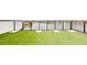 Rooftop deck with artificial turf and waterfront view at 772 Gran Kaymen Way, Apollo Beach, FL 33572