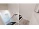 A staircase with hardwood flooring and white walls at 772 Gran Kaymen Way, Apollo Beach, FL 33572
