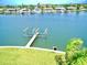 Picturesque waterfront property with private dock access, perfect for boating and enjoying the tranquil coastal lifestyle at 772 Gran Kaymen Way, Apollo Beach, FL 33572