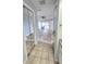 View of bedroom featuring mirrored closet doors and vinyl flooring at 8054 Spring Hill Dr, Spring Hill, FL 34606