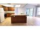 Well-equipped kitchen featuring an island, granite countertops, and ample cabinet space, ideal for cooking at 8054 Spring Hill Dr, Spring Hill, FL 34606