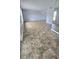 Spacious living area featuring tile flooring and ample room for furniture arrangement, creating a cozy atmosphere at 8054 Spring Hill Dr, Spring Hill, FL 34606