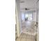 View of patio from bedroom featuring vinyl flooring and light gray walls at 8054 Spring Hill Dr, Spring Hill, FL 34606