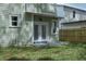 Private outdoor patio area in backyard, perfect for relaxation and entertaining at 807 E Ida St # 1, Tampa, FL 33603