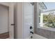 Bathroom featuring white subway tile and granite accent tile at 807 E Ida St # 1, Tampa, FL 33603