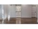 Bedroom with hardwood floors and a barn door to the en-suite bathroom at 807 E Ida St # 1, Tampa, FL 33603