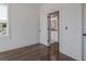 Bedroom featuring an ensuite bathroom and hardwood floors at 807 E Ida St # 1, Tampa, FL 33603