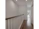 Hallway featuring hardwood floors with white painted doors and trim at 807 E Ida St # 1, Tampa, FL 33603