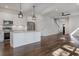 Modern, open kitchen features stainless steel appliances, granite countertops, and a spacious island at 807 E Ida St # 1, Tampa, FL 33603