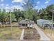 Charming home with brick accents, a cozy front porch, and a well-maintained front lawn at 811 E Flora St, Tampa, FL 33604
