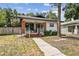 Quaint single-story home with a brick front porch and walkway at 811 E Flora St, Tampa, FL 33604
