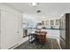 Bright, spacious kitchen with an island, white cabinets, and stainless steel appliances at 811 E Flora St, Tampa, FL 33604