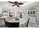 Inviting dining area with seating for four, a round table, and an open layout at 8141 Aquila St # 346, Port Richey, FL 34668