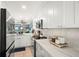 A modern kitchen featuring stainless steel appliances and quartz countertops at 8141 Aquila St # 346, Port Richey, FL 34668