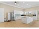 Well-appointed kitchen area with expansive granite countertops, custom white cabinetry, and modern appliances at 8141 Aquila St # 346, Port Richey, FL 34668