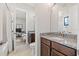Granite counters, wood cabinets and neutral flooring make this bathroom pleasing at 8919 Drummer Plank Dr, Wesley Chapel, FL 33545