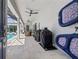 Outdoor covered patio with dining area, ceiling fans, and easy access to the refreshing pool area at 8919 Drummer Plank Dr, Wesley Chapel, FL 33545