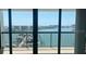 This balcony view overlooks the water and neighboring buildings at 9525 Blind Pass Rd # 508, St Pete Beach, FL 33706