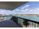 Enjoy breathtaking views of the harbor and skyline from the private balcony with black metal railings at 9525 Blind Pass Rd # 508, St Pete Beach, FL 33706