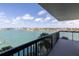 Breathtaking water views from the private balcony, showcasing the marina and waterfront properties at 9525 Blind Pass Rd # 508, St Pete Beach, FL 33706