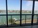 Enjoy this balcony view overlooking the water and neighborhood at 9525 Blind Pass Rd # 508, St Pete Beach, FL 33706