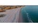 Breathtaking aerial view of the beach and coastline at sunset at 9525 Blind Pass Rd # 508, St Pete Beach, FL 33706