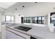 Modern kitchen featuring water views, sleek countertops, and modern appliances at 9525 Blind Pass Rd # 508, St Pete Beach, FL 33706