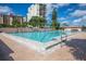 Community pool featuring clear blue water at 9525 Blind Pass Rd # 508, St Pete Beach, FL 33706